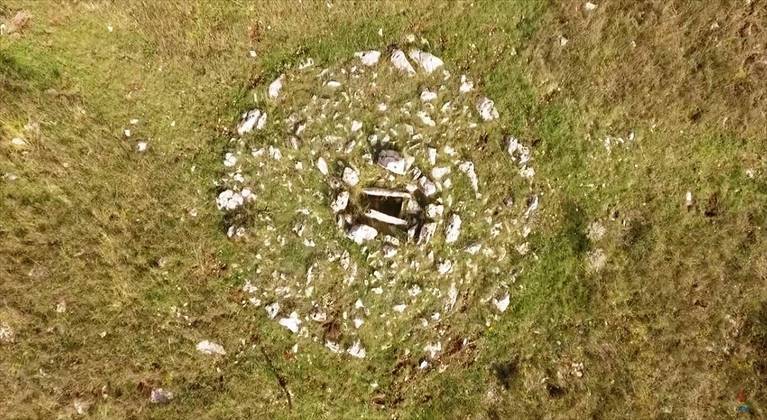 Ancient stone mound in the San Magno necropolis, from the birdseye view.